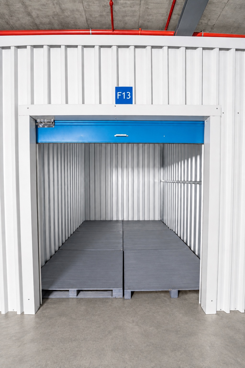 Open roller-shutter door on unit F13