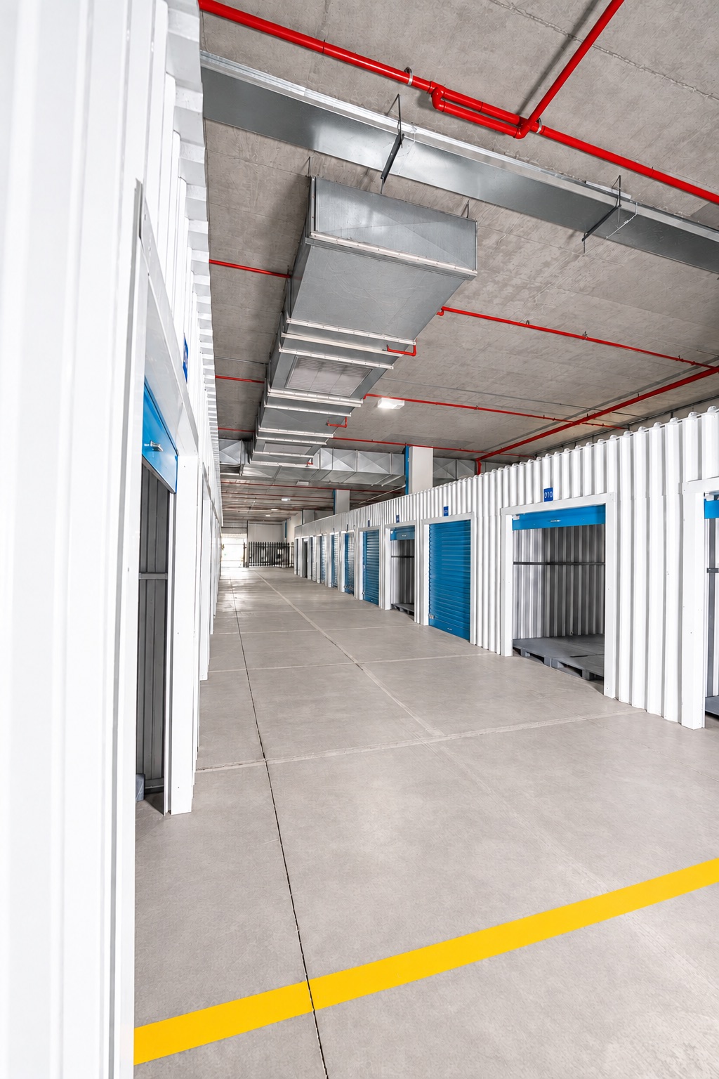Wide indoor aisle and open storage units